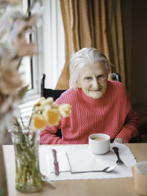 Resident enjoying a cup of tea